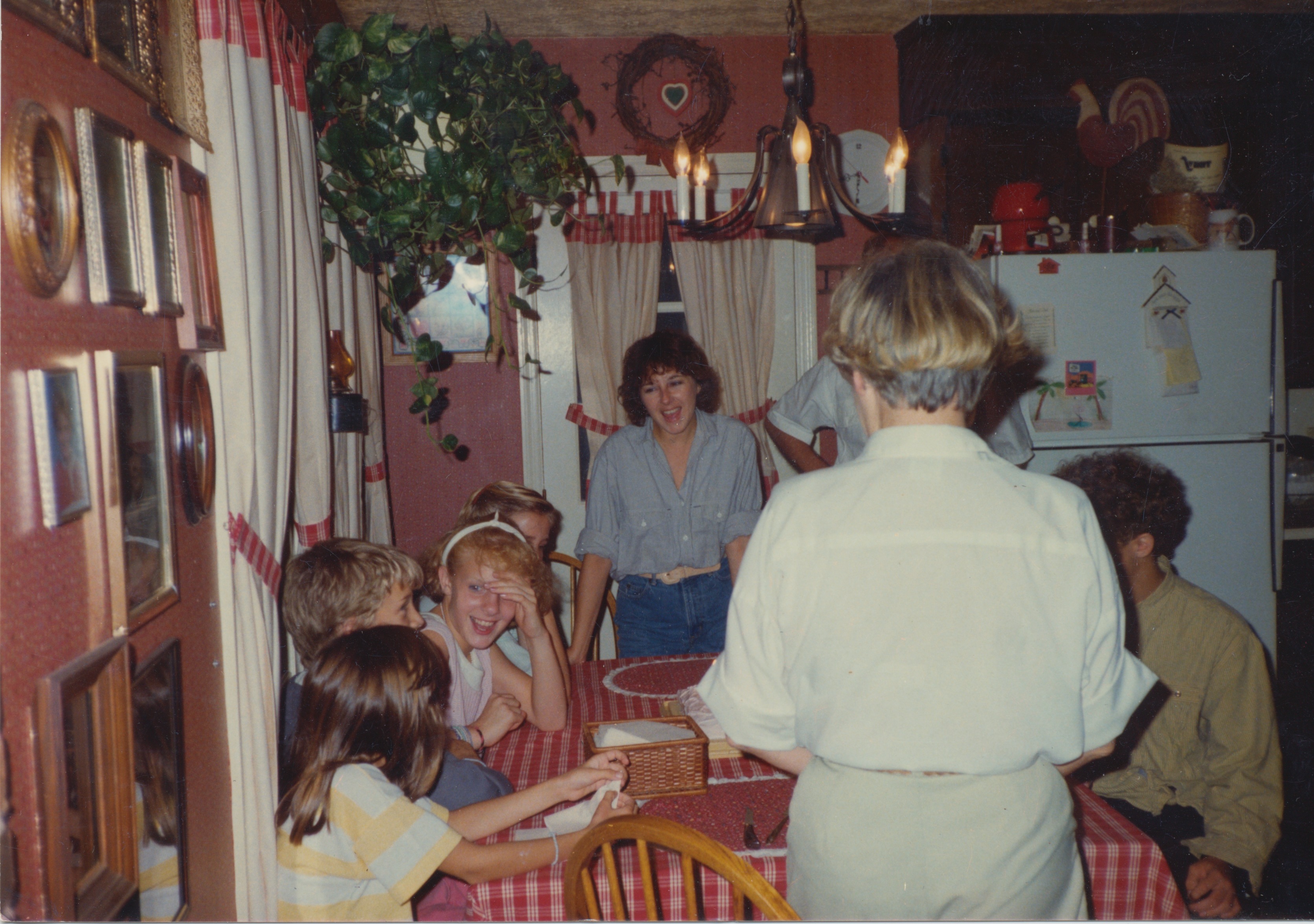 The Payne family gathered around the kitchen table in the early 1980s